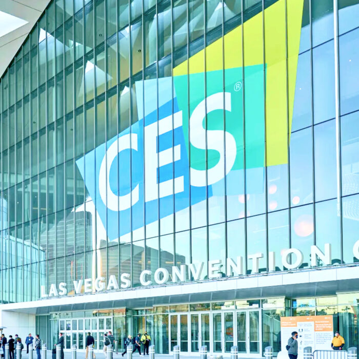 A large CES logo on the Las Vegas Convention Center tradeshow hall exterior.